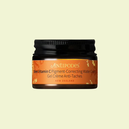 Jar of Antipodes skincare product on a light beige background