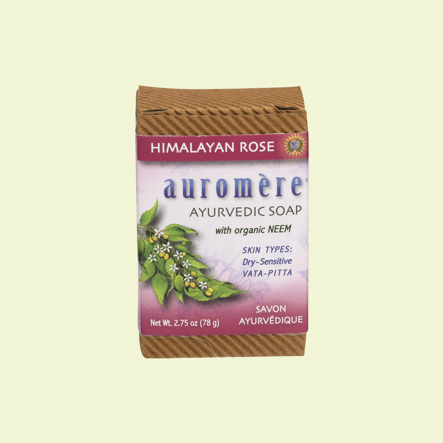 Auromère Ayurvedic Soap packaging with Himalayan Rose flavor on a light yellow background