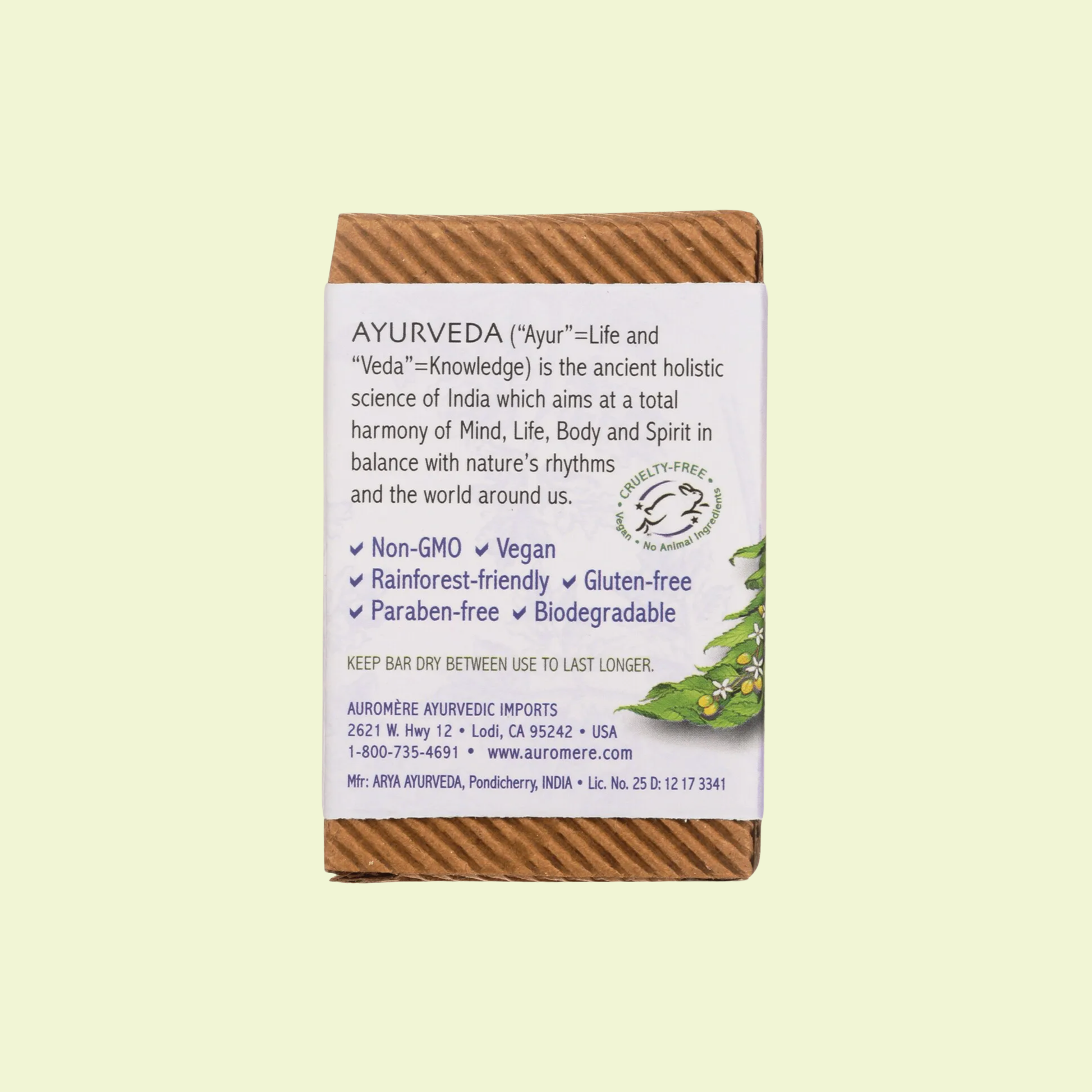 Bar of soap with Ayurveda information on a light beige background