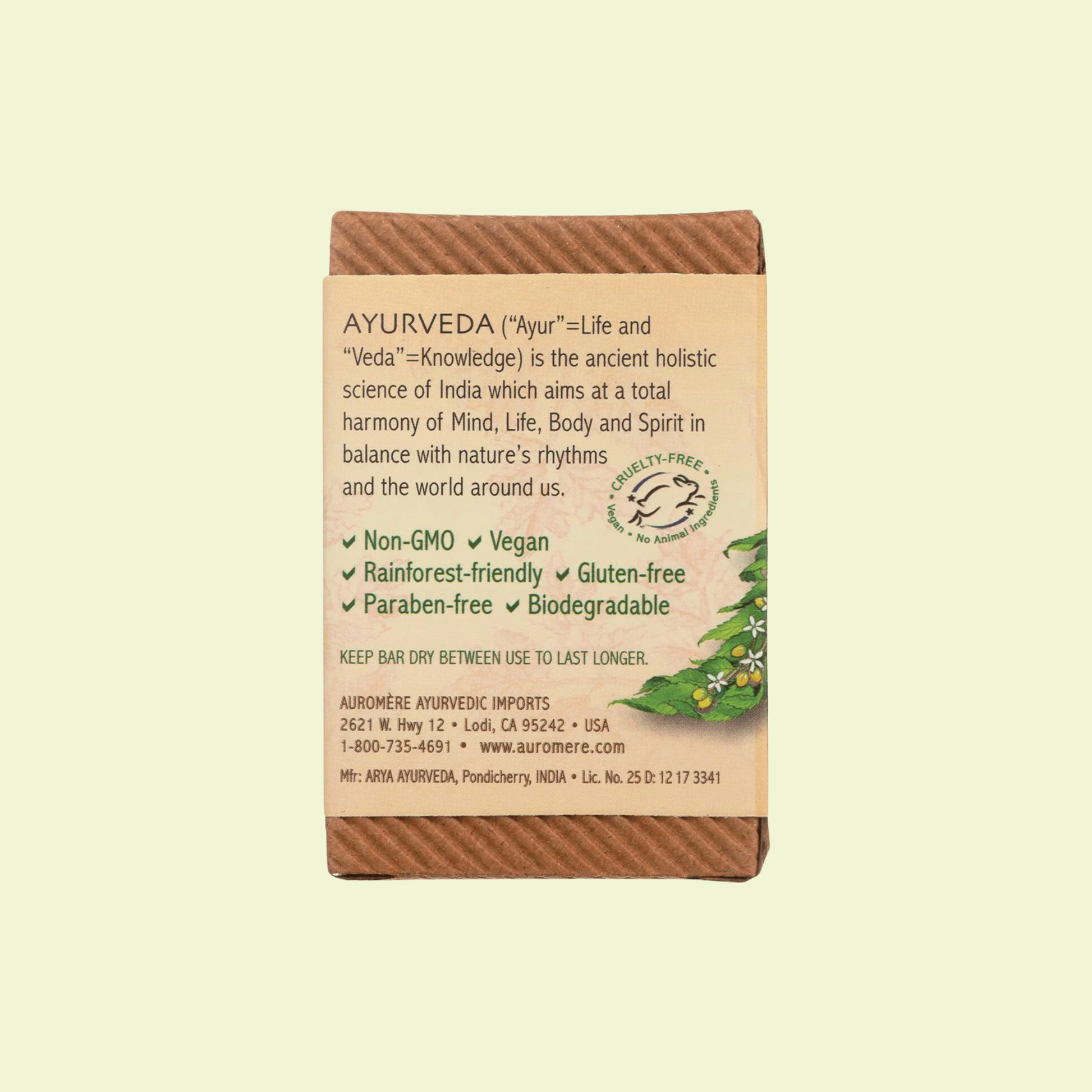 Bar of soap with Ayurveda label on a beige background