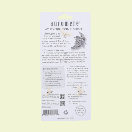 Auromère Ayurvedic tongue scraper packaging on a light green background