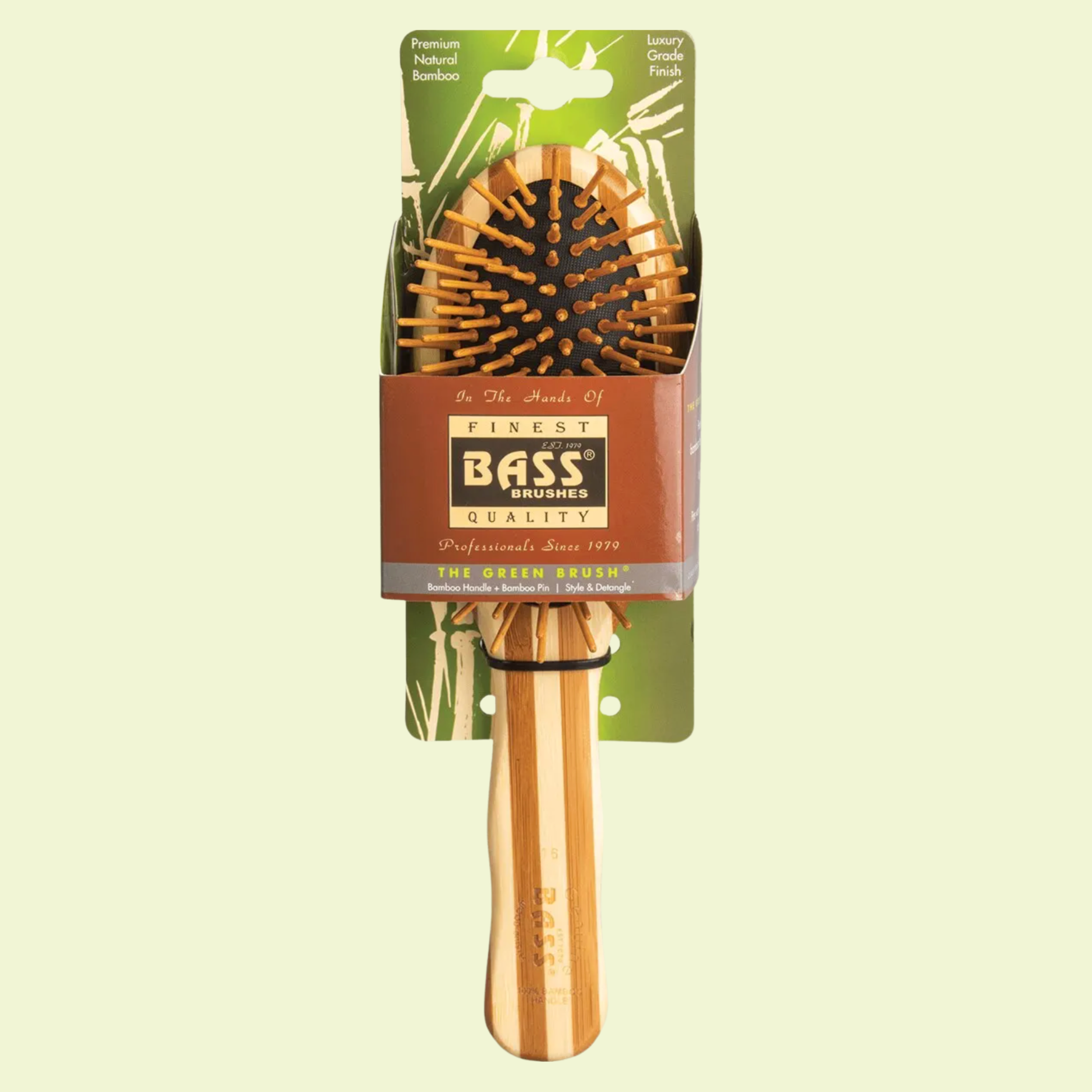 Bass Brushes hairbrush with packaging on a light green background