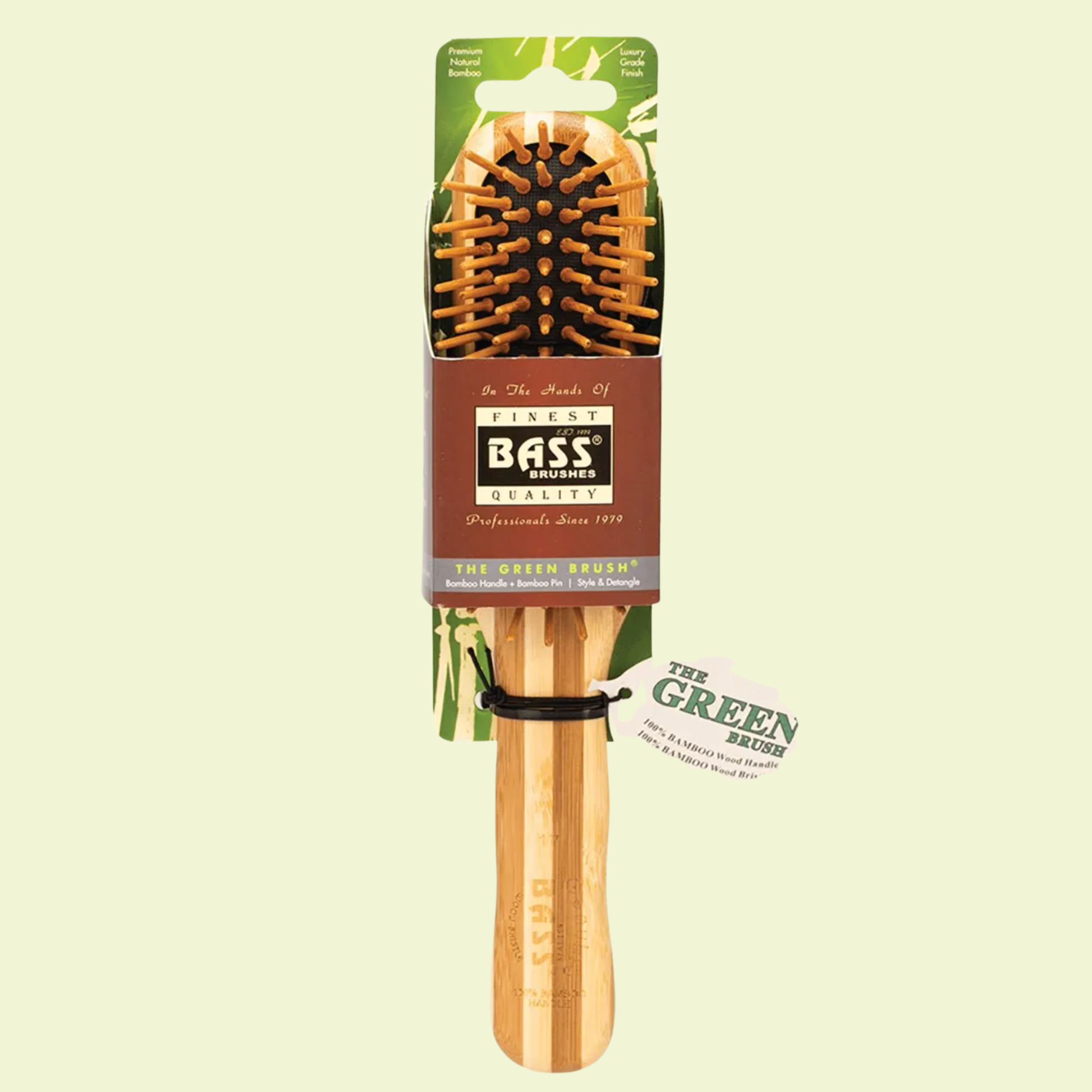 Bass Brushes hairbrush with packaging on a light green background