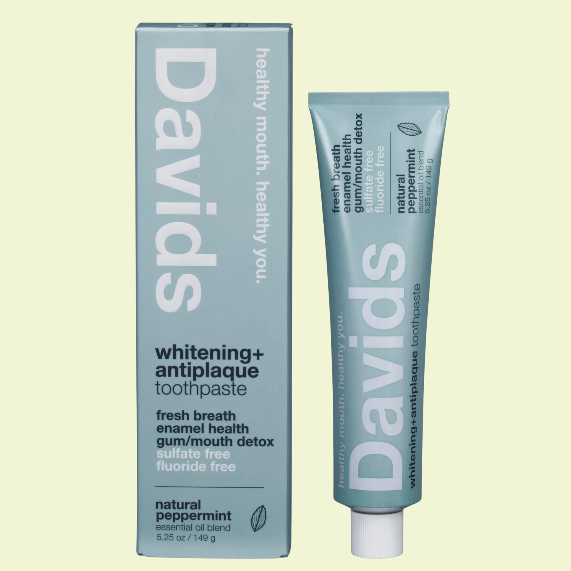 Davids whitening and antiplaque toothpaste packaging on a light green background
