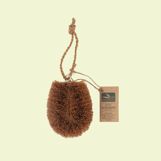 Brown dish scrubber with rope on a beige background