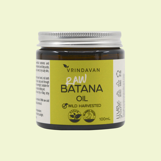 Jar of Vrindavan Raw Batana Oil on a light green background
