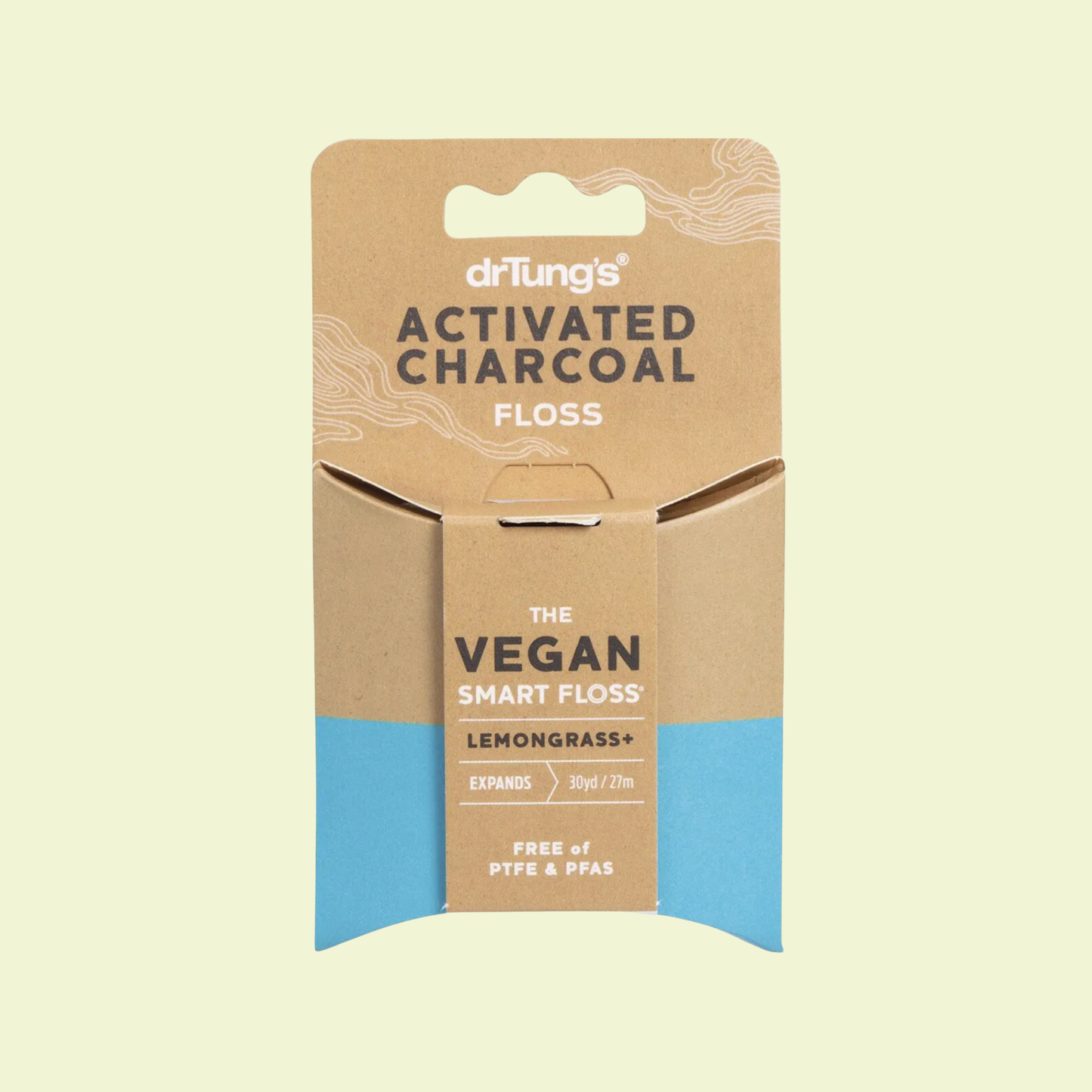 Dr. Tung's Activated Charcoal Floss packaging on a beige background