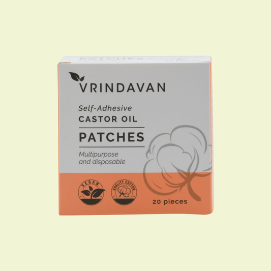 Box of Vrindavan self-adhesive castor oil patches on a beige background