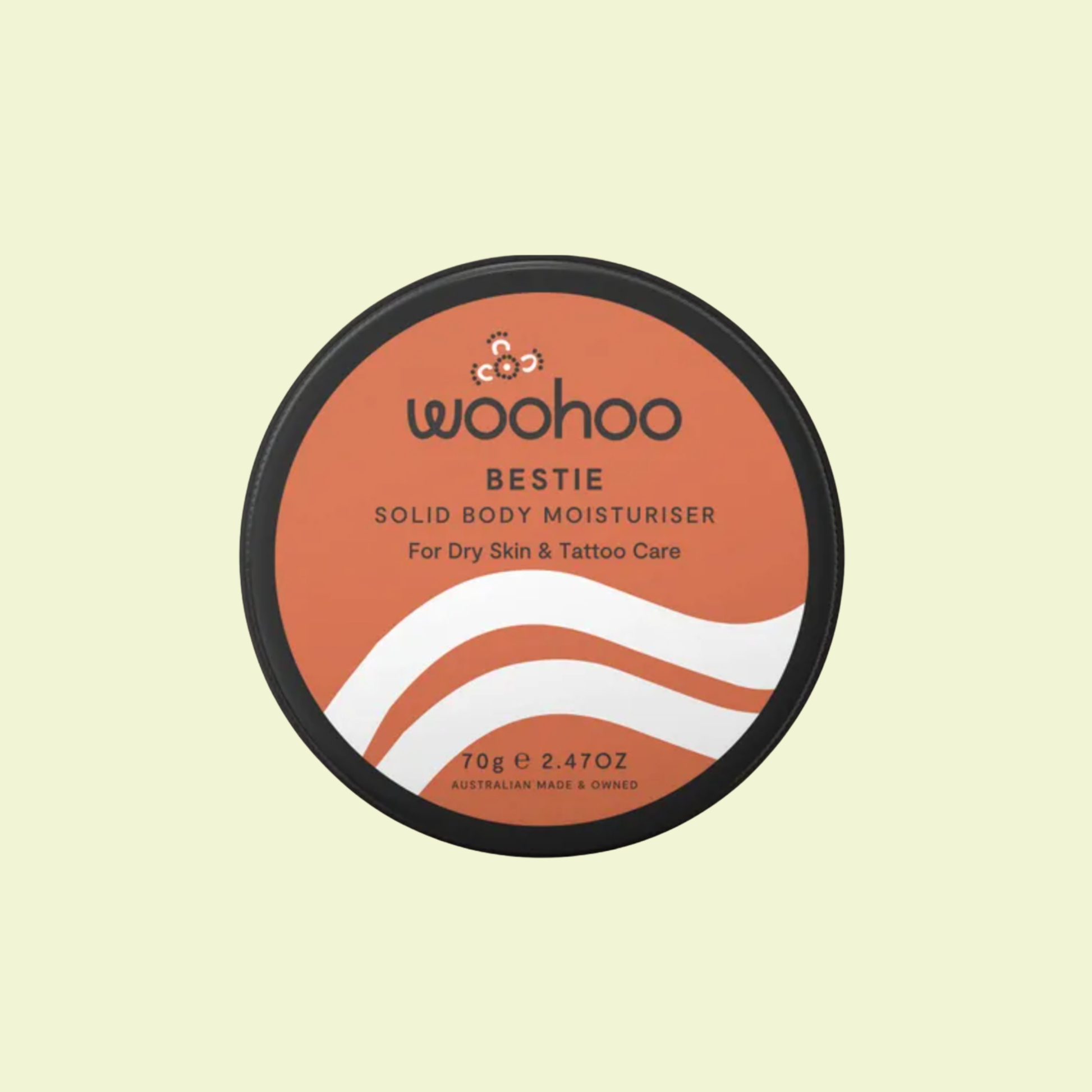 Container of woohoo Bestie Solid Body Moisturizer on a light beige background