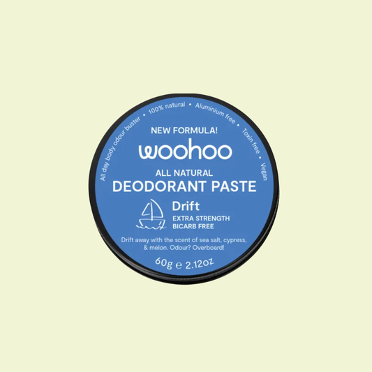 Woohoo all natural deodorant paste container on a light yellow background